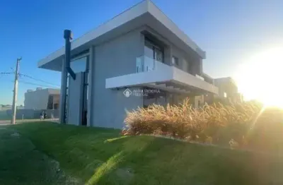 Casa em condomínio fechado com 4 quartos à venda na rua rio divisa, 32, centro, xangri-lá, 224 m2 por r$ 2.299.000