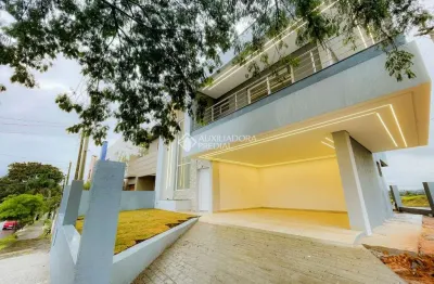 Casa em condomínio fechado com 4 quartos à venda na rua verdes campos, 431, mário quintana, porto alegre, 217 m2 por r$ 1.260.000