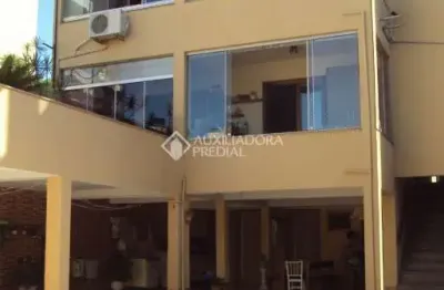 Casa com 3 quartos à venda na avenida benno mentz, 1088, vila ipiranga, porto alegre, 290 m2 por r$ 1.200.000