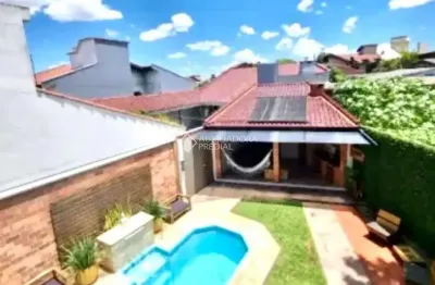 Casa com 3 quartos à venda na rua borges de medeiros, 61, niterói, canoas, 250 m2 por r$ 1.250.000