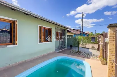 Casa com 3 quartos à venda na rua corujas, 437, jardim algarve, alvorada, 120 m2 por r$ 304.000