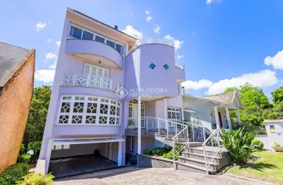 Casa em condomínio fechado com 4 quartos à venda na rua tocantins, 869, lomba do pinheiro, porto alegre, 397 m2 por r$ 1.400.000