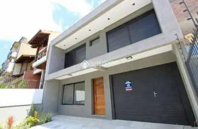 Casa em condomínio fechado com 3 quartos para alugar na rua buarque de macedo, 931, são geraldo, porto alegre, 176 m2 por r$ 7.900