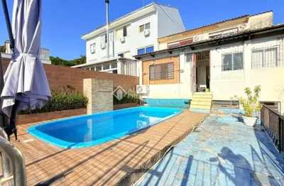 Casa com 4 quartos à venda na Rua Comendador Albino Cunha, 270, Cristo Redentor, Porto Alegre, 183 m2 por R$ 799.000