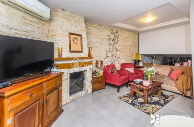 Casa em condomínio fechado com 3 quartos à venda na rua erechim, 100, nonoai, porto alegre, 199 m2 por r$ 650.000