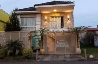 Casa em condomínio fechado com 3 quartos à venda na rua ronaldo molina de quadros, 330, mário quintana, porto alegre, 266 m2 por r$ 1.090.000