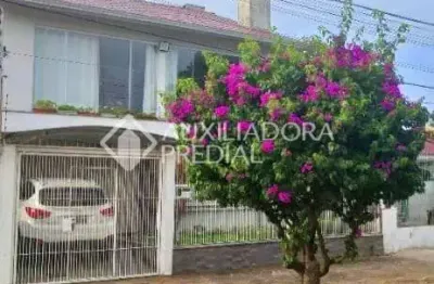 Casa em condomínio fechado com 4 quartos à venda na rua pedro waine, 194, santa maria goretti, porto alegre, 244 m2 por r$ 834.900