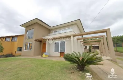 Casa em condomínio fechado com 3 quartos à venda na estrada dos guterres, 2565, fiuza, viamão, 391 m2 por r$ 1.000.000