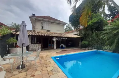 Casa em condomínio fechado com 4 quartos à venda na rua camerino, 152, petrópolis, porto alegre, 390 m2 por r$ 1.650.000