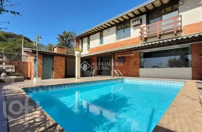 Casa em condomínio fechado com 4 quartos à venda na rua carlos huber, 826, três figueiras, porto alegre, 318 m2 por r$ 1.596.000