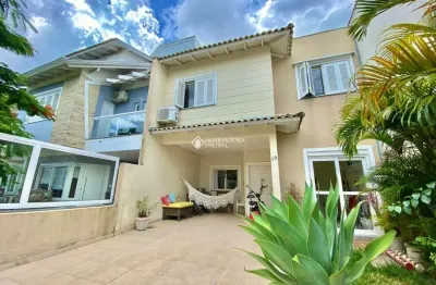 Casa em condomínio fechado com 4 quartos à venda na rua louro, 19, hípica, porto alegre, 160 m2 por r$ 689.990