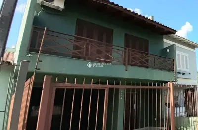 Casa com 4 quartos à venda na rua constantino fernando onorato bottin, 224, hípica, porto alegre, 200 m2 por r$ 460.000