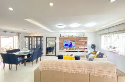 Casa em condomínio fechado com 3 quartos à venda na rua roberto santini, 224, hípica, porto alegre, 125 m2 por r$ 660.000