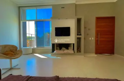 Casa com 3 quartos à venda na rua luiz delfino, 210, espírito santo, porto alegre, 155 m2 por r$ 999.900