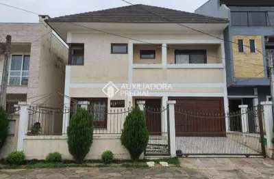 Casa em condomínio fechado com 3 quartos à venda na rua guatambu, 833, hípica, porto alegre, 256 m2 por r$ 800.000