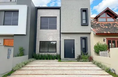 Casa em condomínio fechado com 3 quartos à venda na rua jean vardaramatos, 130, hípica, porto alegre, 153 m2 por r$ 810.000