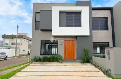 Casa em condomínio fechado com 3 quartos à venda na rua jean vardaramatos, 130, hípica, porto alegre, 157 m2 por r$ 910.000