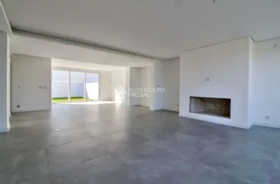 Casa em condomínio fechado com 3 quartos à venda na rua ivo walter kern, 599, hípica, porto alegre, 256 m2 por r$ 1.594.900