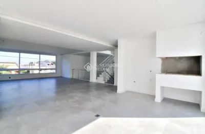 Casa em condomínio fechado com 3 quartos à venda na rua ivo walter kern, 599, hípica, porto alegre, 256 m2 por r$ 1.595.000