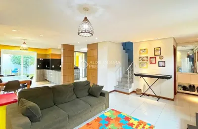 Casa em condomínio fechado com 3 quartos à venda na rua guatambu, 645, hípica, porto alegre, 130 m2 por r$ 659.900