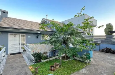 Casa com 3 quartos à venda na rua tenente-coronel mário doernte, 110, ipanema, porto alegre, 290 m2 por r$ 1.700.000