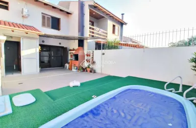Casa em condomínio fechado com 3 quartos à venda na rua edgar sanches laurent, 77, hípica, porto alegre, 124 m2 por r$ 569.000