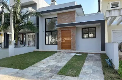 Casa em condomínio fechado com 3 quartos à venda na rua pau brasil, 635, hípica, porto alegre, 95 m2 por r$ 659.000