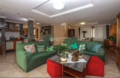 Casa com 3 quartos à venda na travessa miguel pereira, 120, medianeira, porto alegre, 544 m2 por r$ 1.748.500