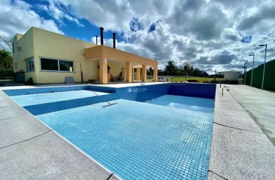 Casa em condomínio fechado com 3 quartos à venda na avenida juca batista, 5505, hípica, porto alegre, 94 m2 por r$ 559.000