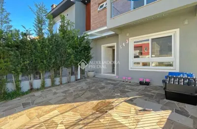 Casa em condomínio fechado com 3 quartos à venda na rua aldo sani, 143, hípica, porto alegre, 127 m2 por r$ 699.000