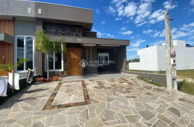 Casa em condomínio fechado com 3 quartos à venda na avenida juca batista, 5505, hípica, porto alegre, 157 m2 por r$ 695.000