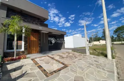 Casa em condomínio fechado com 3 quartos à venda na avenida juca batista, 5505, hípica, porto alegre, 164 m2 por r$ 695.000