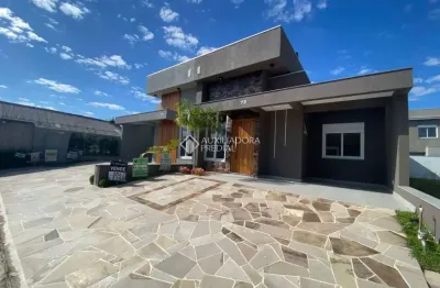 Casa em condomínio fechado com 3 quartos à venda na Avenida Juca Batista, 5505, Hípica, Porto Alegre, 164 m2 por R$ 693.000