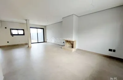 Casa em condomínio fechado com 3 quartos à venda na avenida juca batista, 5505, hípica, porto alegre, 147 m2 por r$ 800.000