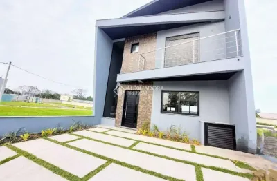 Casa em condomínio fechado com 3 quartos à venda na avenida juca batista, 5505, hípica, porto alegre, 147 m2 por r$ 805.000