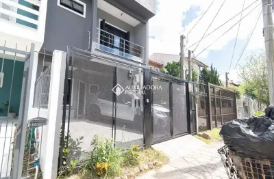 Casa em condomínio fechado com 3 quartos à venda na rua pau brasil, 539, hípica, porto alegre, 149 m2 por r$ 640.000