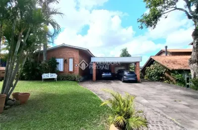 Casa em condomínio fechado com 5 quartos à venda na avenida firmino octávio bimbi, 255, cavalhada, porto alegre, 274 m2 por r$ 1.390.000