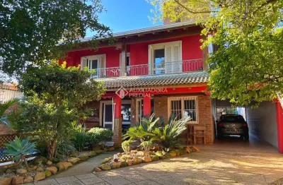 Casa com 4 quartos à venda na avenida guaíba, 10660, ipanema, porto alegre, 250 m2 por r$ 1.130.000