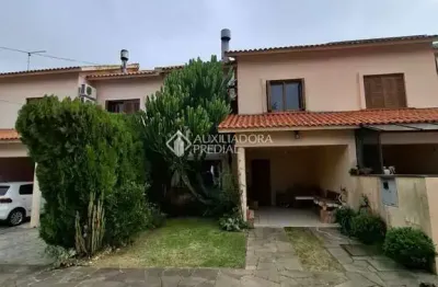 Casa em condomínio fechado com 3 quartos à venda na avenida da serraria, 2222, espírito santo, porto alegre, 110 m2 por r$ 560.000