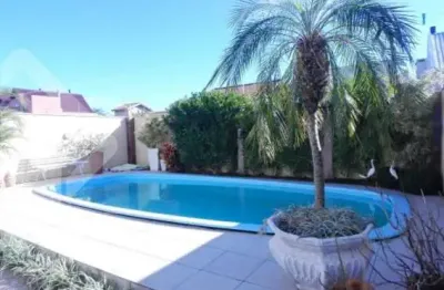 Casa em condomínio fechado com 4 quartos à venda na rua ancara, 381, espírito santo, porto alegre, 242 m2 por r$ 890.000