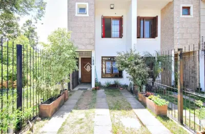 Casa em condomínio fechado com 4 quartos à venda na rua cícero viana, 135, hípica, porto alegre, 168 m2 por r$ 570.000