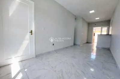 Casa em condomínio fechado com 2 quartos à venda na rua embira, 170, hípica, porto alegre, 52 m2 por r$ 320.000