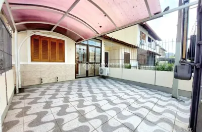 Casa com 2 quartos à venda na Rua Izar Faria Correa Sant'Anna, 71, Hípica, Porto Alegre, 105 m2 por R$ 450.000