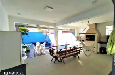 Casa com 3 quartos à venda na Rua Carlos Scliar, 99, Hípica, Porto Alegre, 183 m2 por R$ 690.000