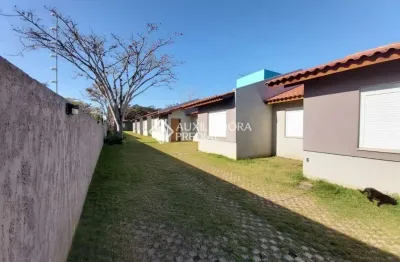 Casa em condomínio fechado com 2 quartos à venda na rua santa mônica, 404, ponta grossa, porto alegre, 60 m2 por r$ 212.000