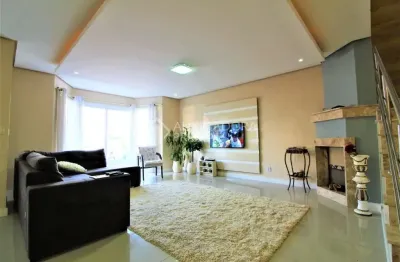 Casa em condomínio fechado com 3 quartos à venda na rua wilson conceição bona, 104, hípica, porto alegre, 131 m2 por r$ 580.000
