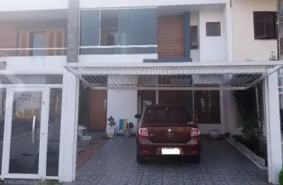 Casa em condomínio fechado com 3 quartos à venda na rua carlos maximiliano fayet, 210, hípica, porto alegre, 148 m2 por r$ 590.000