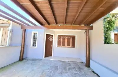 Casa em condomínio fechado com 2 quartos à venda na rua silvestre sauter, 22, hípica, porto alegre, 105 m2 por r$ 360.000