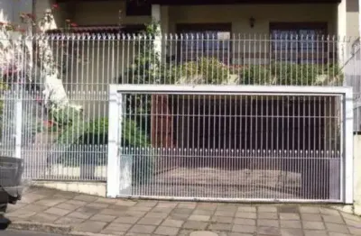 Casa em condomínio fechado com 3 quartos à venda na Rua João Bonuma, 48, Coronel Aparício Borges, Porto Alegre, 326 m2 por R$ 1.200.000