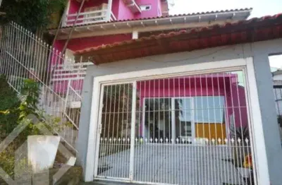 Casa em condomínio fechado com 3 quartos à venda na rua erechim, 70, nonoai, porto alegre, 300 m2 por r$ 600.000